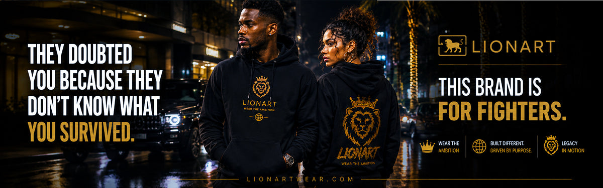 Two people wearing black Lionart hoodies on a city street at night